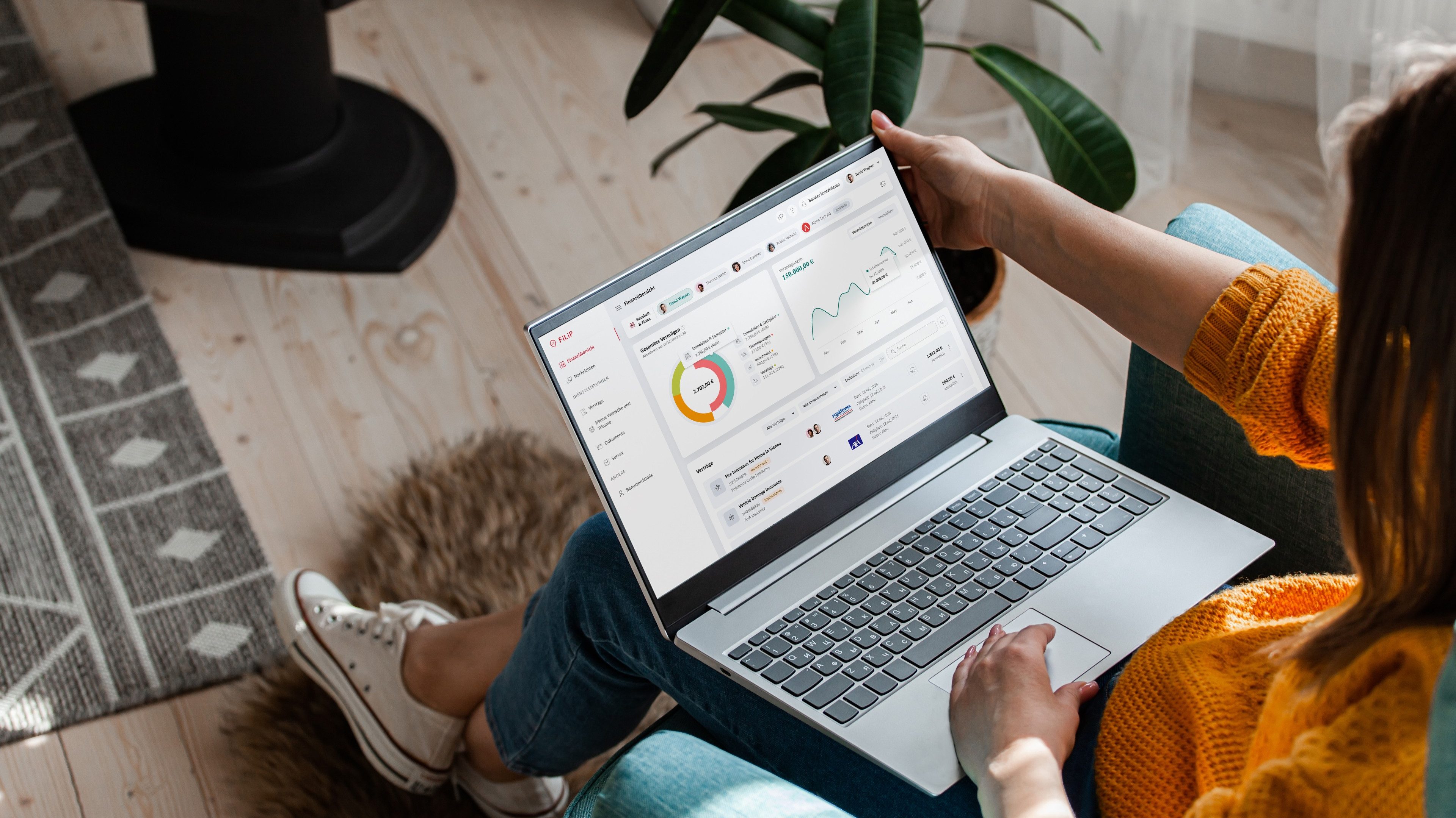 Young woman using laptop to work at home, remote work
