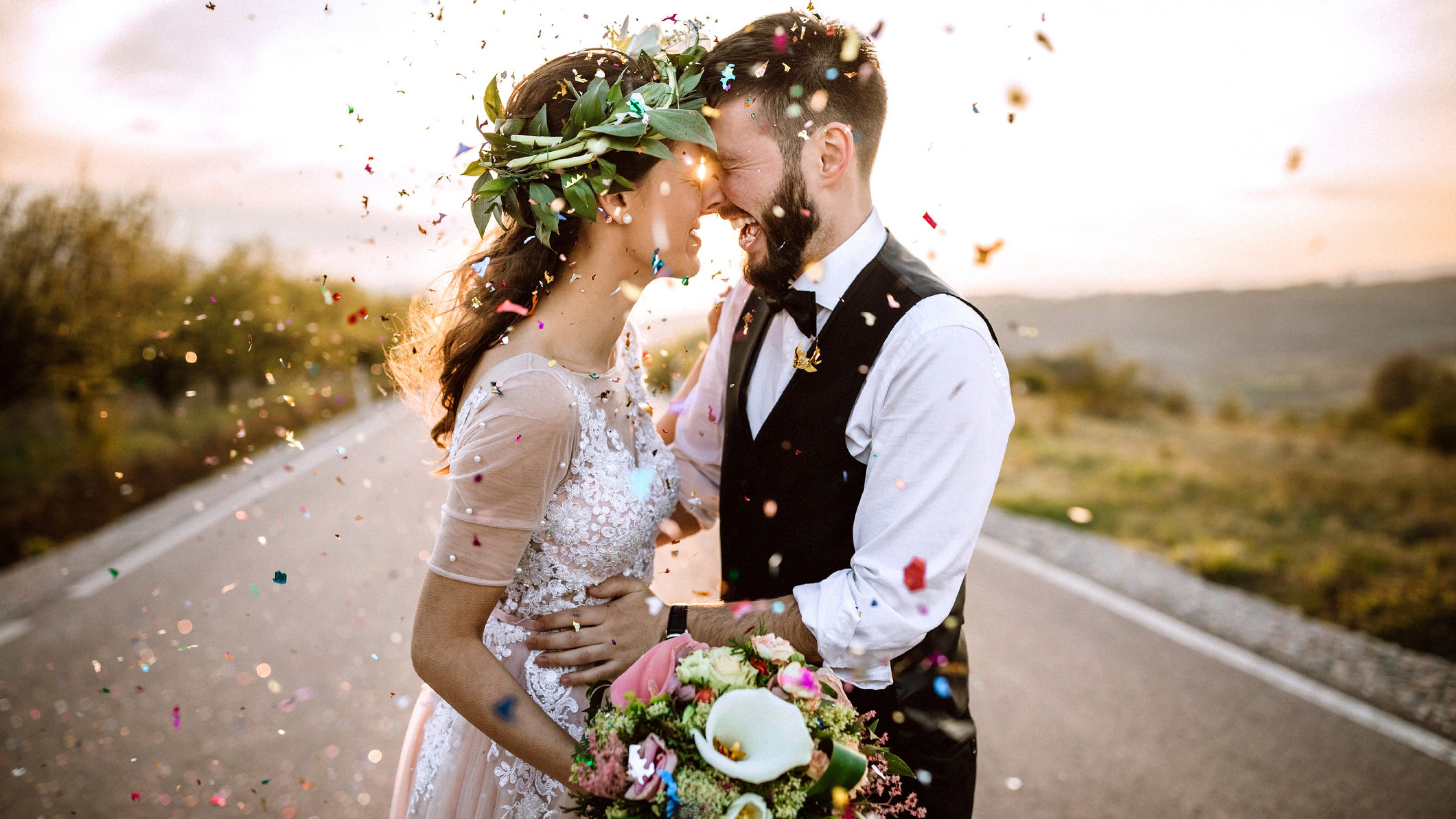 Wedding couple in love, confetti