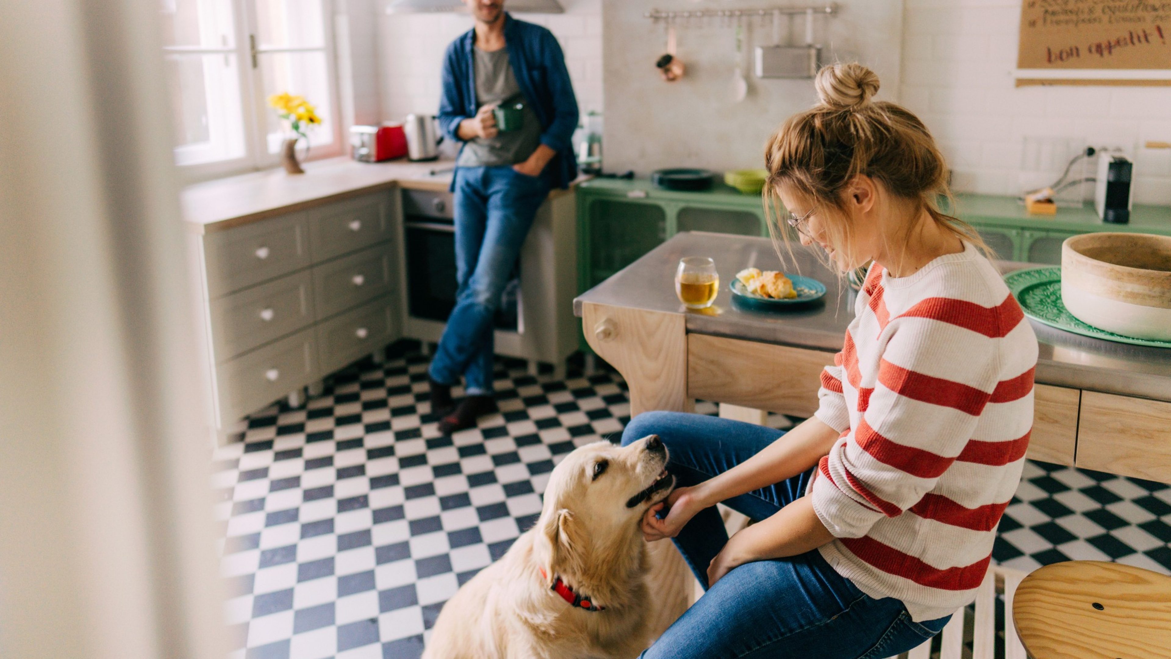 Photo of happy family in a kitchen at the morning